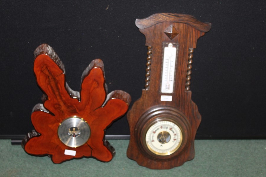 Oak cased barometer/thermometer, barometer housed in a varnished piece of timber (2)