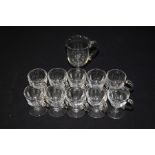 Set of ten glass punch/custard cups, together with a large glass cup with handle, (11)