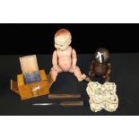 Two toy dolls, together with a cigarette dispenser and a jewellery box