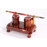 French agate desk stand, the agate pen held above the rectangular stand with a powder and inkwell on