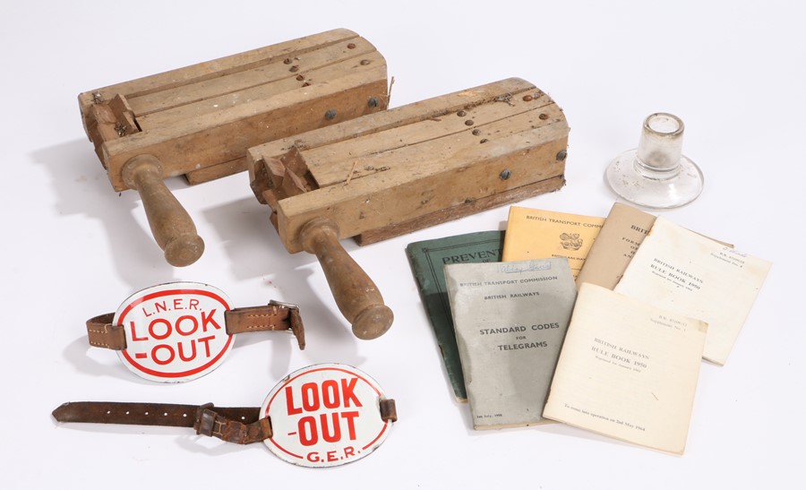 Railwayana, to include L.N.E.R and G.E.R enamel "LOOK-OUT" arm badges, two rattles, L.N.E.R. Co