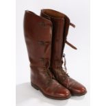 Pair of early 20th Century leather riding boots, with buckle fittings and studs to the soles, (2)