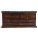 19th Century rosewood collectors cabinet, the green veined marble top above twelve graduated drawers