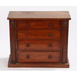 19th century mahogany apprentice's chest of four long drawers, flanked by half turned pilasters,