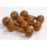 Five 19th Century wooden dumb bells, in the original paint, (5)