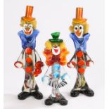 Three Murano glass clowns, one with concertina, the tallest 38cm high (3)