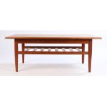 Trioh Danish teak coffee table, the rectangular top raised on turned legs united by a slatted