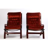 Pair of 1970's armchairs, with crimson button upholstered back and seat cushions and bentwood dark