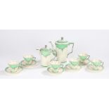 Art Deco coffee set, with green, black and silvered decoration on a white ground, consisting of