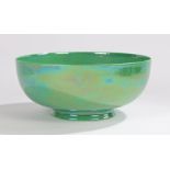 Ruskin pottery green glazed circular footed bowl with iridescent finish, printed and stamped marks