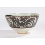 Milland Pottery bowl, with incised stylised bird decoration, 31cm diameter, signed indistinctly to