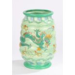 Crown Ducal Charlotte Rhead porcelain vase, the green ground with dragon and scroll decoration, 31cm