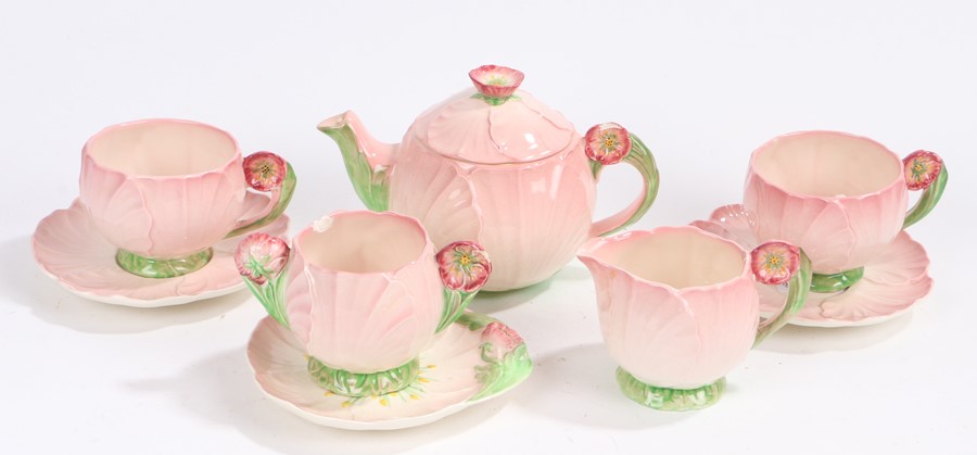 Carlton Ware Australian design duet, of puce petal form, consisting of teapot, two tea cups and