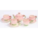 Carlton Ware Australian design duet, of puce petal form, consisting of teapot, two tea cups and