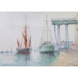 John Tuck, ""Barge arriving alongside coaster, Wells", signed watercolour, housed in a glazed gilt