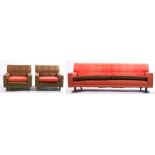 1970's three piece suite, with contrasting red and brown buttoned upholstery, consisting of three