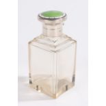 George V silver and clear glass scent bottle, the hinged silver lid with green and white enamel