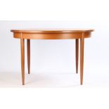 G-Plan teak extending dining table, with internal cantilever leaf, on turned legs, 121.5cm diameter