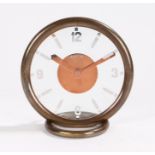 Jaeger Art Deco mantel clock, the circular copper case housing the signed glass dial with silvered