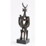 Spelter bronzed sculpture, depicting figures beside a totem pole, on a black plinth base, 22.5cm