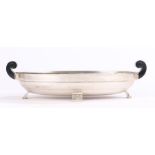 Art Deco style Continental silver oval serving dish, with black scrolled plastic handles, beaten