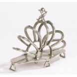 Novelty equestrian themed silver plated toast rack, the pierced finial in the form of a jockey's cap