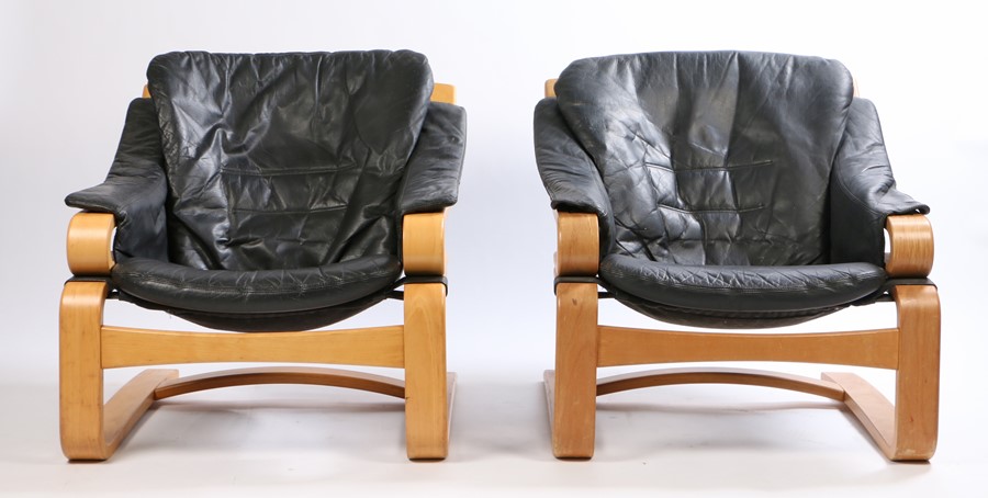 Pair of 1970's armchairs, with blue leather back and seat cushions and bentwood frames (2)