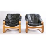 Pair of 1970's armchairs, with blue leather back and seat cushions and bentwood frames (2)