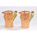 J.H.W. & Sons Hanley Falcon Ware pair of jugs, the tree bark effect bodies with a green woodpecker