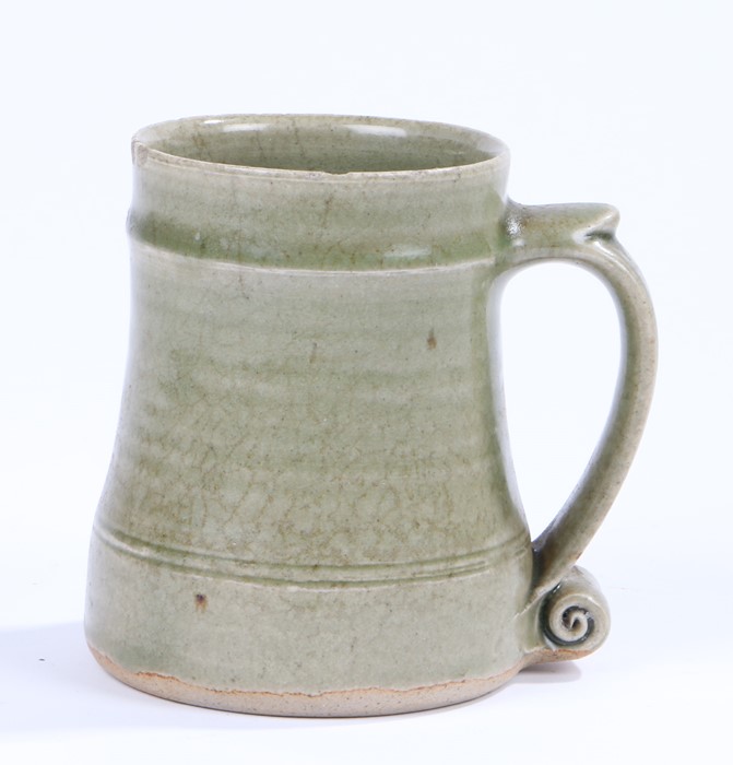 Bernard Leach pottery tankard, with scroll handle, 12cm high