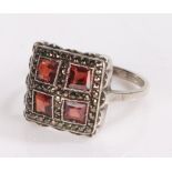 Art Deco style white metal and spinel ring. the head of square from and with marcasite decoration