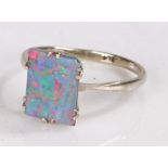 9 carat white gold and opal ring, the rectangular opal mounted in a basket form mount ring size Q
