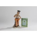 Capodimonte porcelain figure by M. Lory, depicting a tramp holding a ball, with certificate