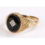 9 carat gold signet ring, with a diamond set to the onyx head, ring size X