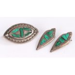 White metal and onyx pair of earring and a brooch, the pear shape earrings set with green onyx and