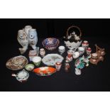 Collection of Chinese and Japanese porcelain, to include miniature vases, peacocks, a hen, fish