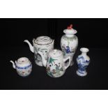 Collection of Chinese porcelain, to include a vase and cover, three teapots and a blue and white