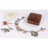 Jewellery, to include an enamel pendant bracelet, a flower head brooch and another bracelet, (3)