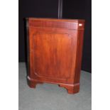 Mahogany floor standing corner cupboard, with simulated panelled cupboard door, 65cm wide