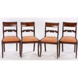 Set of four Regency mahogany dining chairs, with a deep bar back and sweeping gadrooned splat