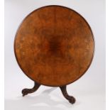 Victorian mahogany and walnut breakfast table, the circular walnut top with a mahogany moulded