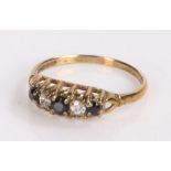 9 carat gold ring the pierced mount set with three sapphires and two zircon ring size M