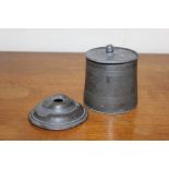 19th Century pewter tobacco jar and cover with interior tamper, 11cm high