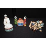 Japanese porcelain group holding a lidded basket, together with two further figures, (3)