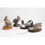 Heritage Decoys common loon and Canada goose by J.B. Garton, on wooden plinth bases, pottery brown