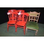 Set of four red painted dining chairs, with curved cresting rails, pierced splat backs, solid dished