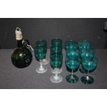 Six green glass wine glasses, five similar glasses and a carafe (12)