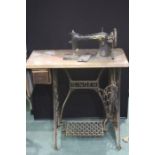 Singer treadle sewing machine, on a cast iron frame