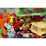 Variety of kids toys and a puzzle.