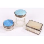 Two George V silver and clear glass dressing table pots and covers, London 1925 and 1930, the blue